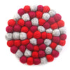 Hand Crafted Felt Ball Trivets from Nepal: Round Chakra, Reds - Global Groove (T) - The Village Country Store 