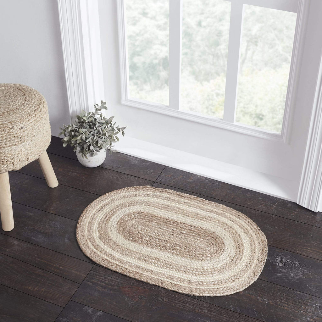 http://thevillagecountrystore.com/cdn/shop/products/the-village-country-store-accent-rugs-natural-creme-jute-rug-oval-w-pad-20x30-29977632374958_1024x1024.jpg?v=1707366104